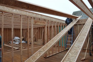 Second story joists going in. 